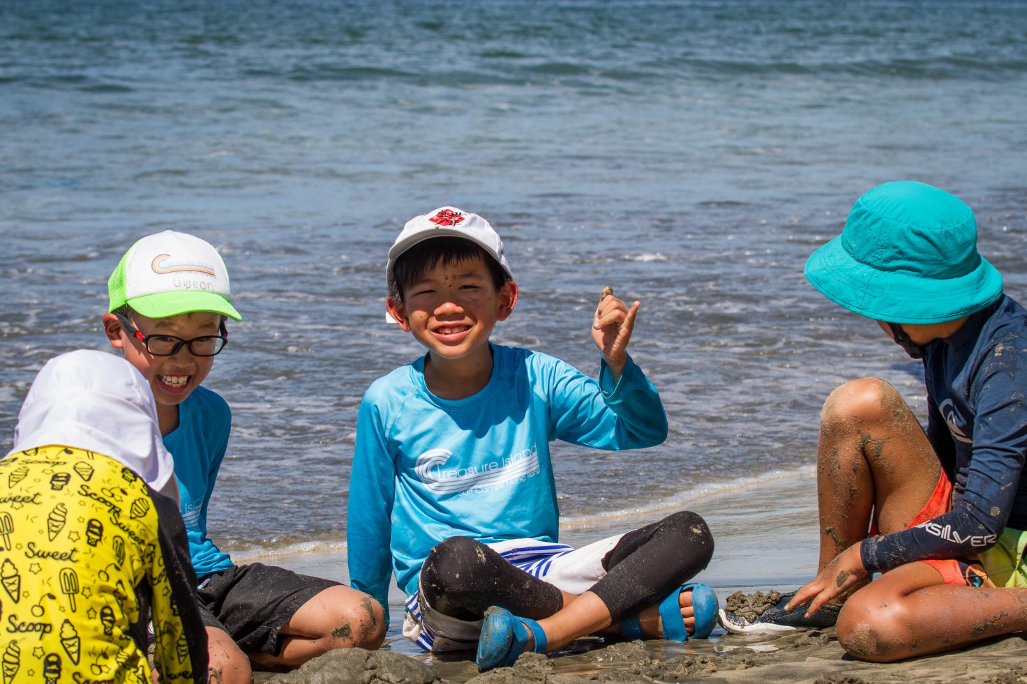 little kids having fun on beach